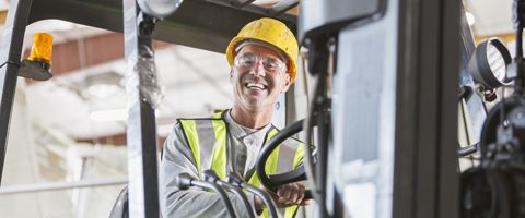 Forklift driver in his cabine